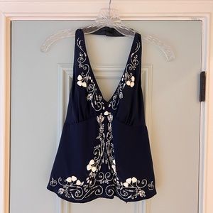 Nanette Lepore silk halter top in a rich navy blue, size 2. Low back with tie.